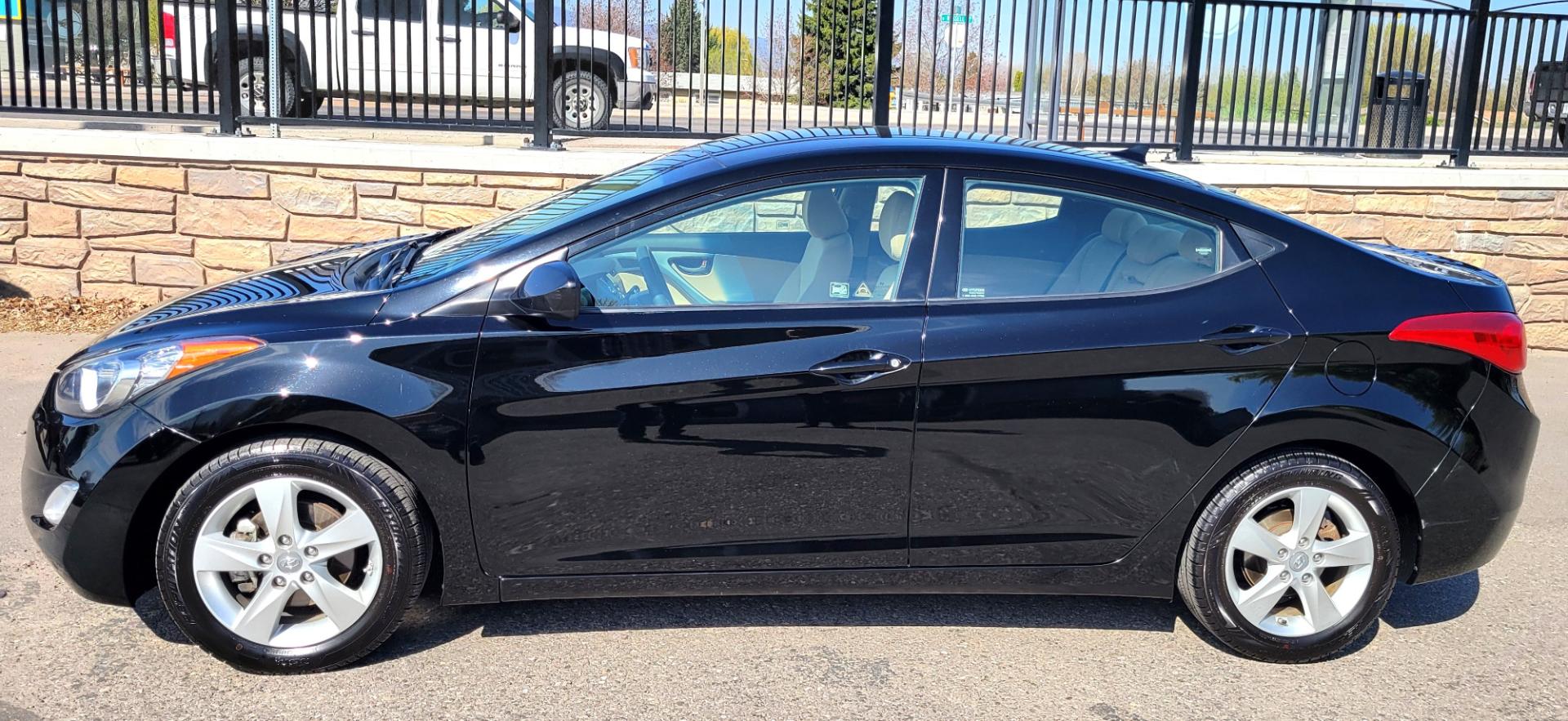 2013 Black /Tan Hyundai Elantra GLS (KMHDH4AE8DU) with an 1.8L I4 engine, 6 Speed Auto transmission, located at 450 N Russell, Missoula, MT, 59801, (406) 543-6600, 46.874496, -114.017433 - Low Mile Front Wheel Drive Sedan. One Owner. Excellent Fuel Economy. 1.8L I4 Engine. 6 Speed Automatic Transmission. AirConditioning. Power Windows and Locks. Bluetooth. - Photo#4